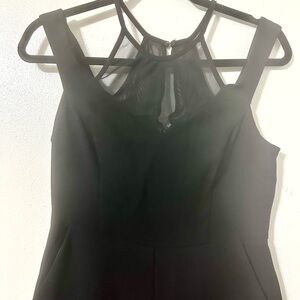 bebe Black Strapless Jumpsuit with Sheer Mesh Halter Yoke